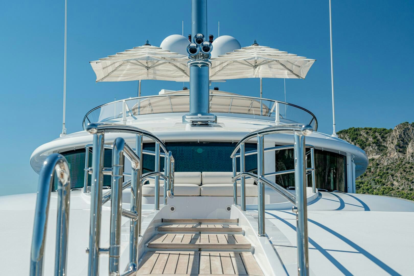 a boat with an umbrella on it aboard JUSTA DELIA Yacht for Sale