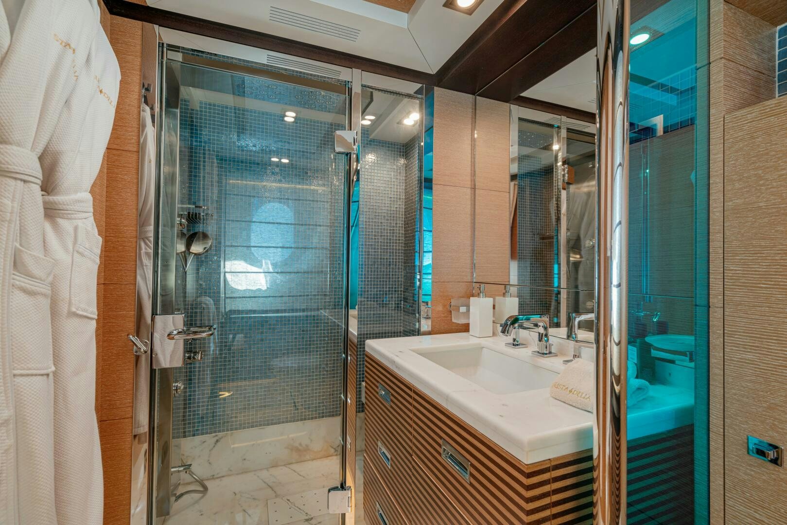 a bathroom with a glass shower aboard JUSTA DELIA Yacht for Sale
