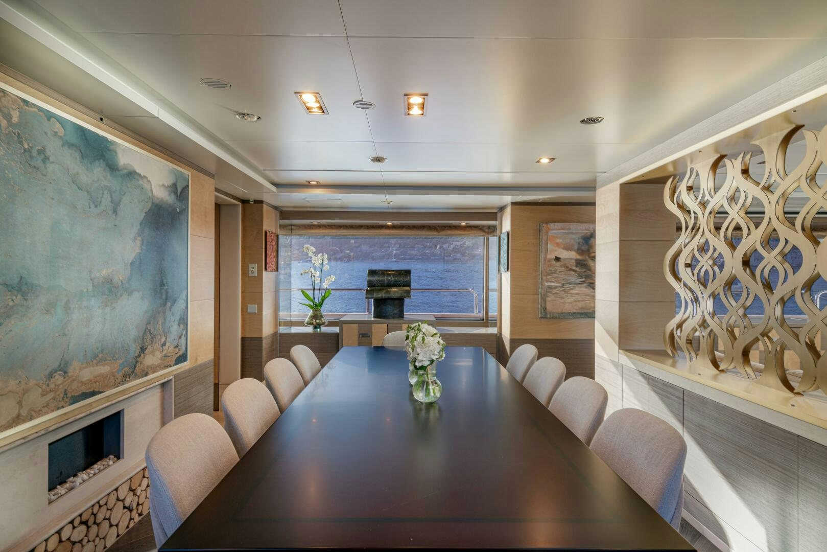 a room with a table and chairs aboard JUSTA DELIA Yacht for Sale