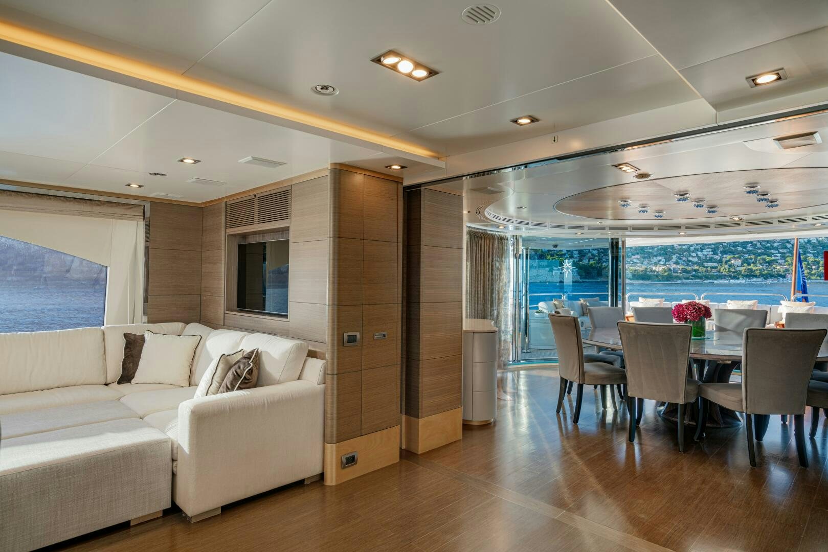 a living room with a large window aboard JUSTA DELIA Yacht for Sale