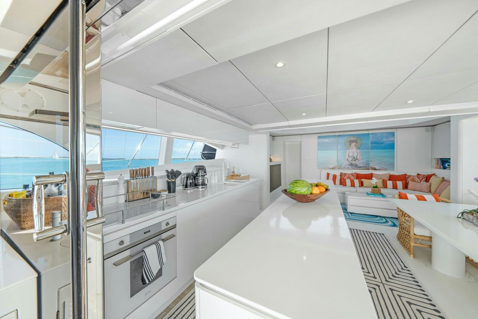 a kitchen with a glass wall aboard ROYAL RITA Yacht for Sale