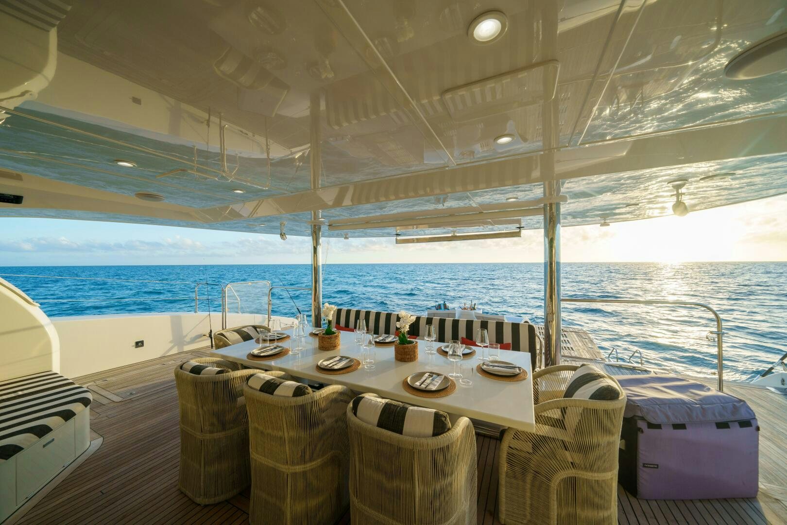 a table set for a meal on a boat aboard ROYAL RITA Yacht for Sale