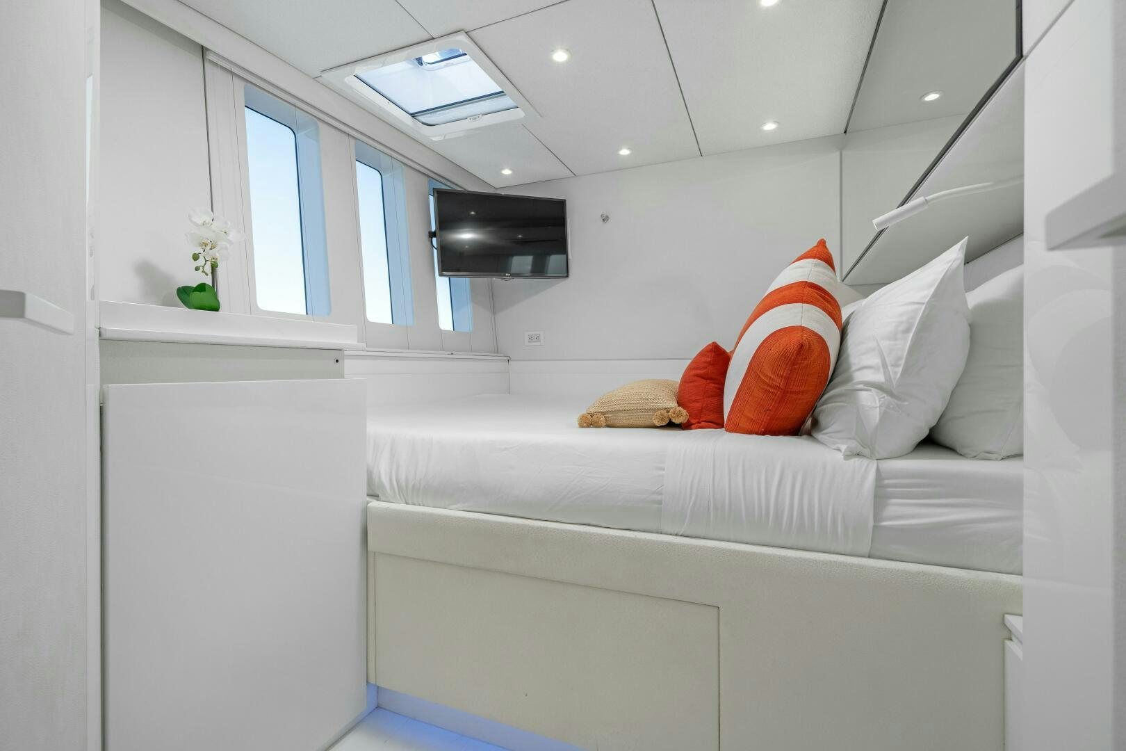 a white couch with pillows aboard ROYAL RITA Yacht for Sale