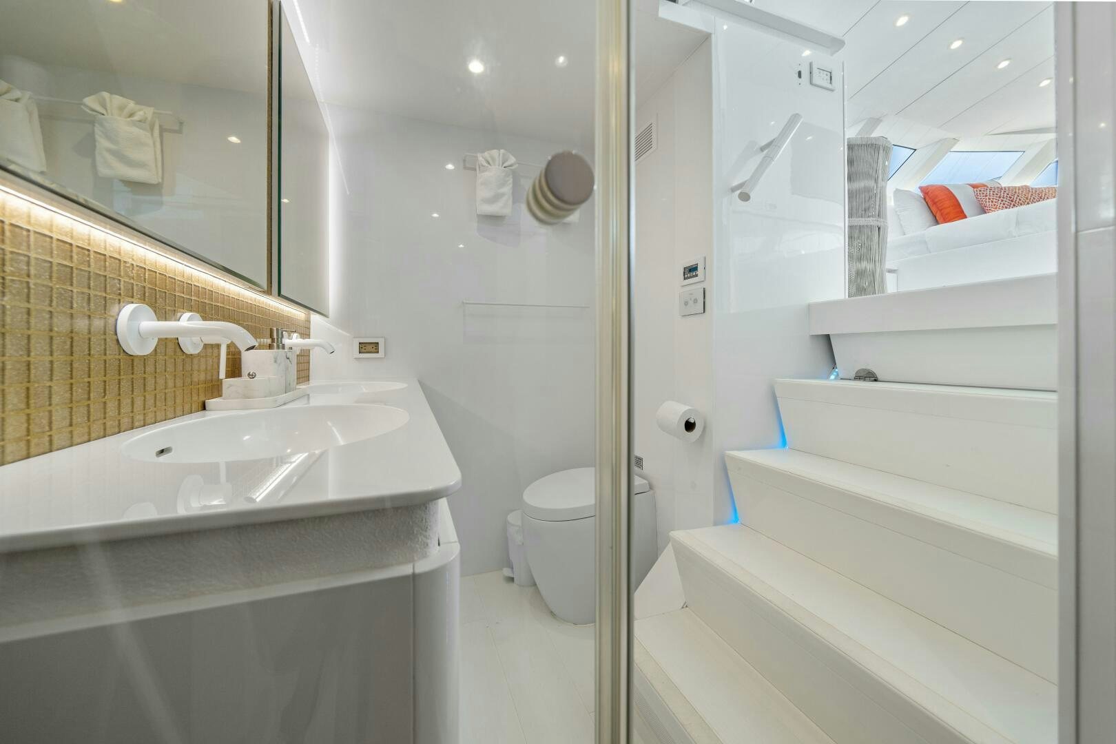 a bathroom with a sink and a toilet aboard ROYAL RITA Yacht for Sale