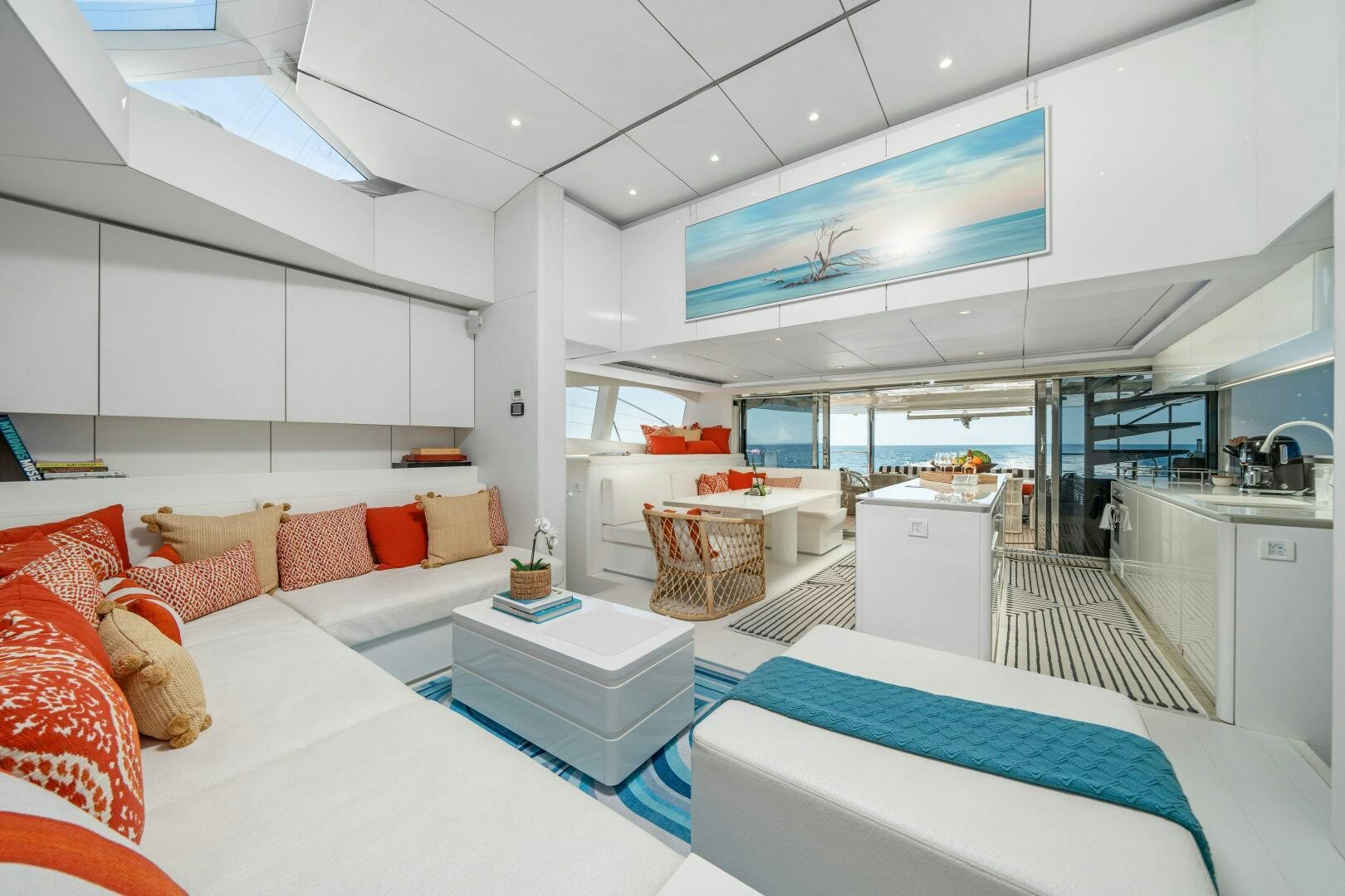 a room with a bed and a table aboard ROYAL RITA Yacht for Sale