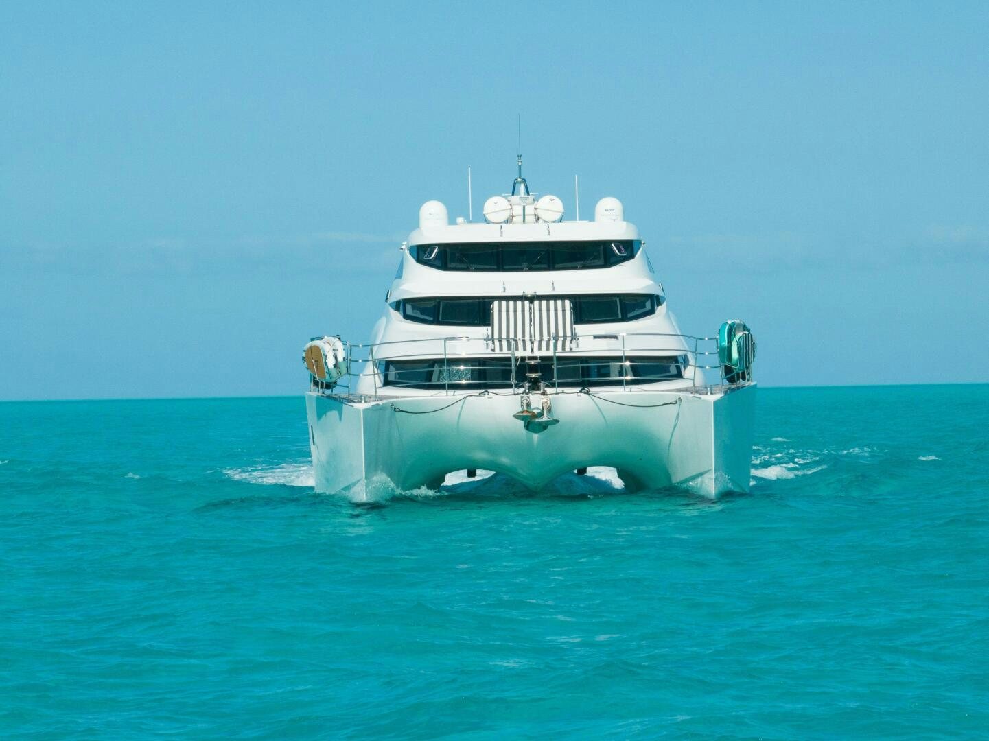 a white boat in the water aboard ROYAL RITA Yacht for Sale