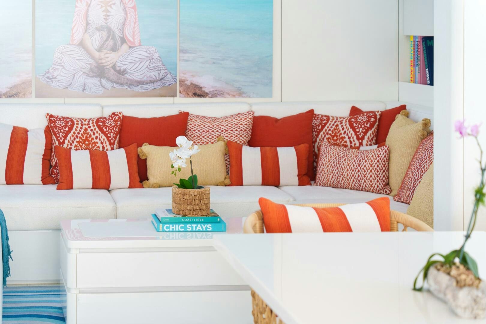 a white table with pillows and a white tablecloth with a white couch and a white tablecloth aboard ROYAL RITA Yacht for Sale