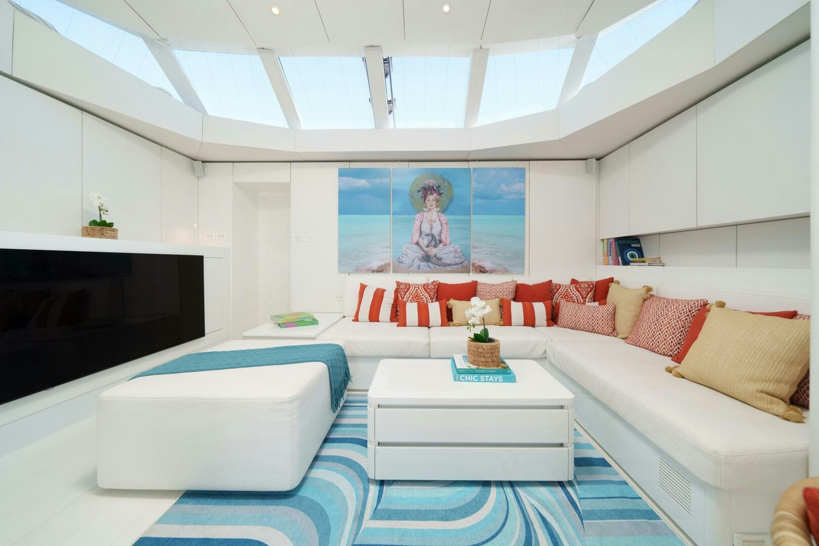 a room with a couch and a table aboard ROYAL RITA Yacht for Sale
