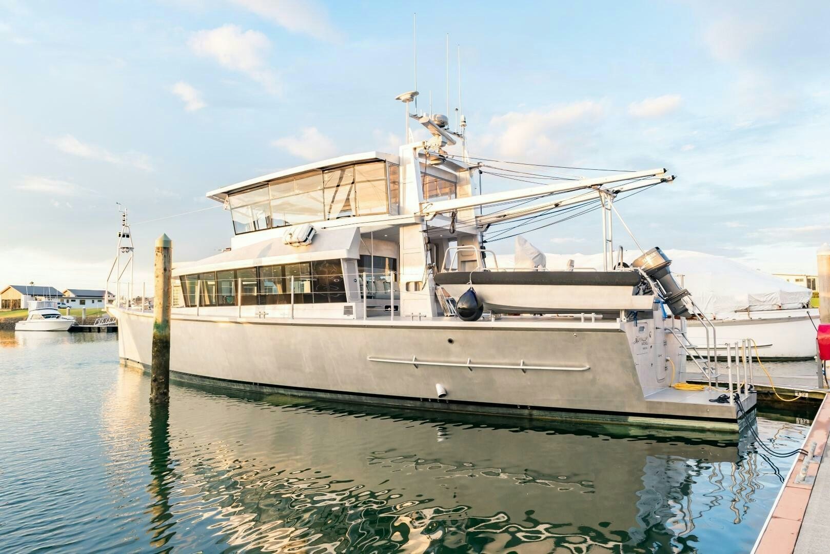 a large white boat in the water aboard BUFFALO NICKEL Yacht for Sale