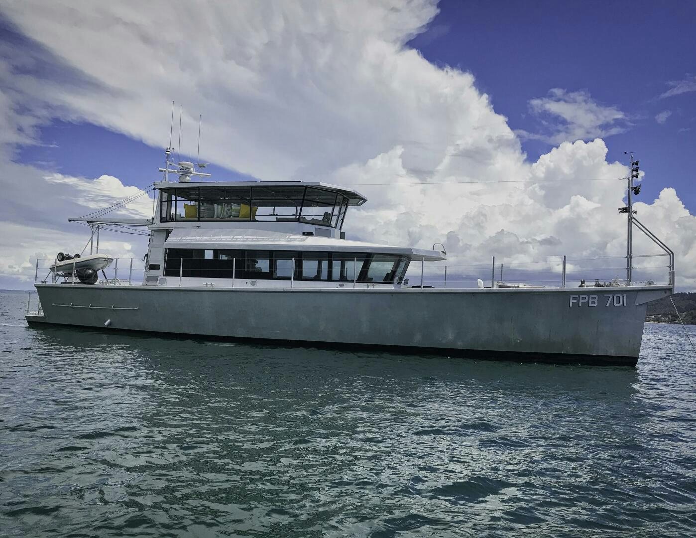 a large white boat in the water aboard BUFFALO NICKEL Yacht for Sale