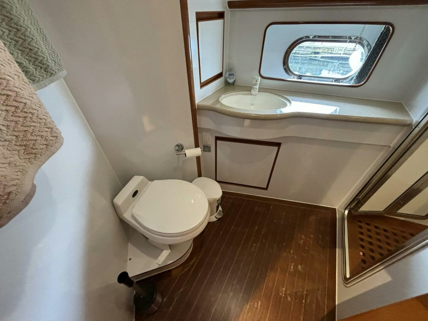 a bathroom with a sink and a toilet aboard ROYAL VIKING Yacht for Sale