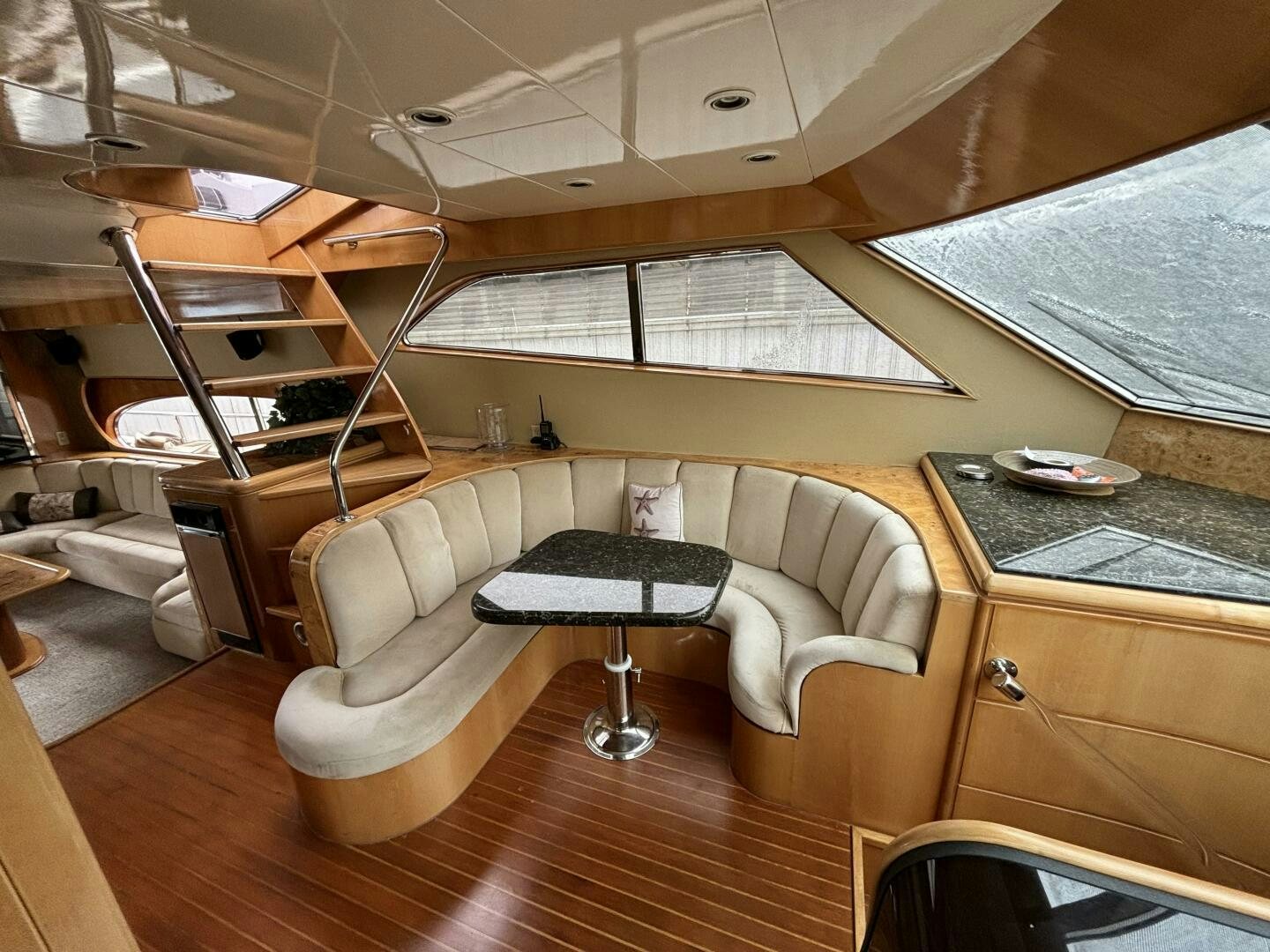 a room with a couch and a table aboard ROYAL VIKING Yacht for Sale
