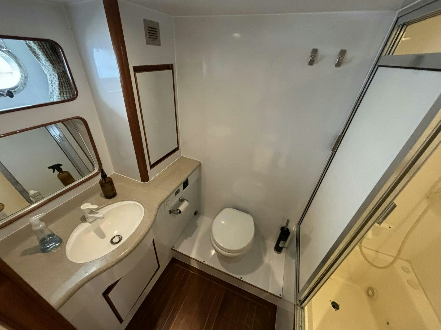 a bathroom with a sink and a toilet aboard ROYAL VIKING Yacht for Sale