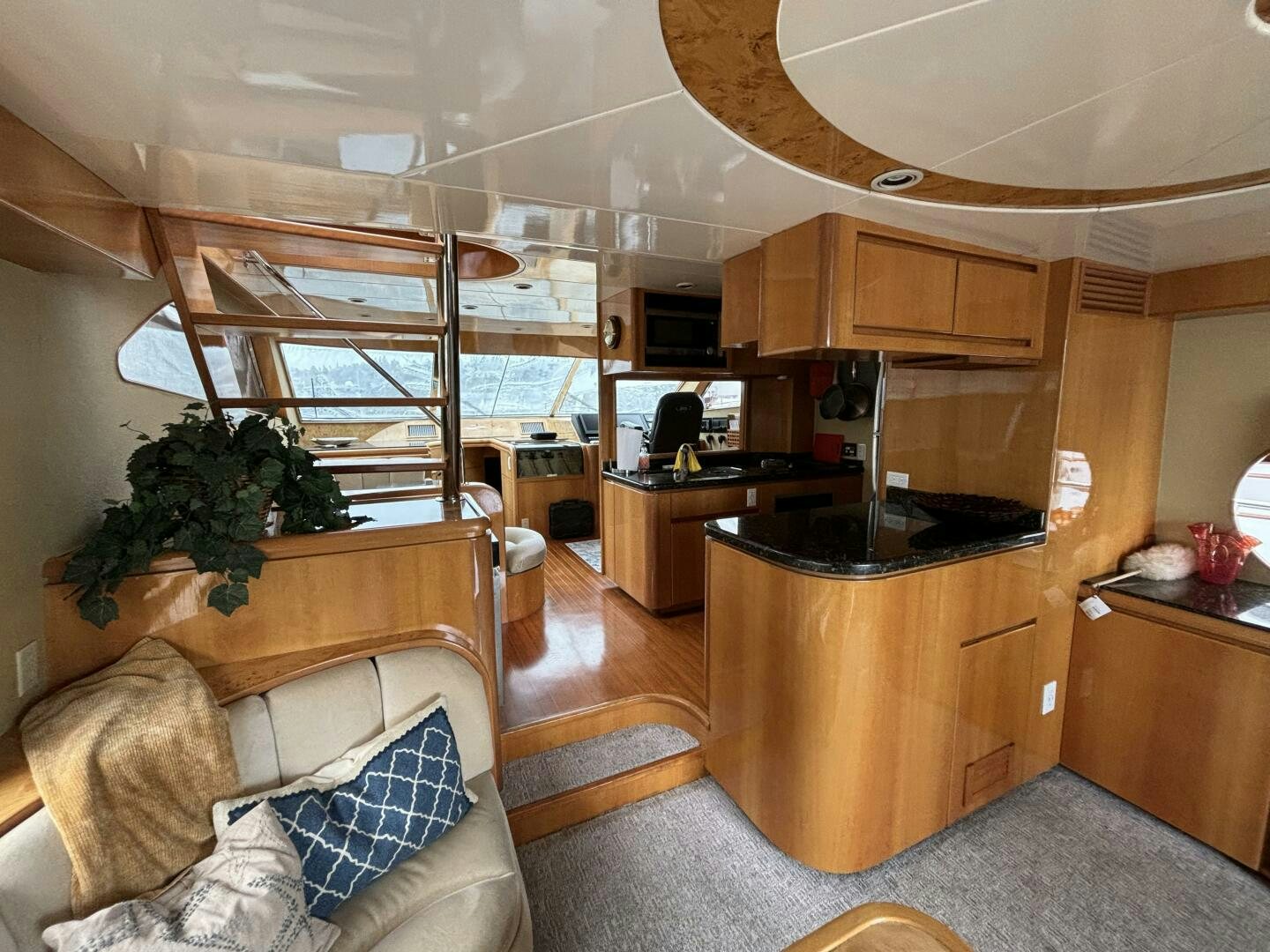 a living room with a wood floor aboard ROYAL VIKING Yacht for Sale
