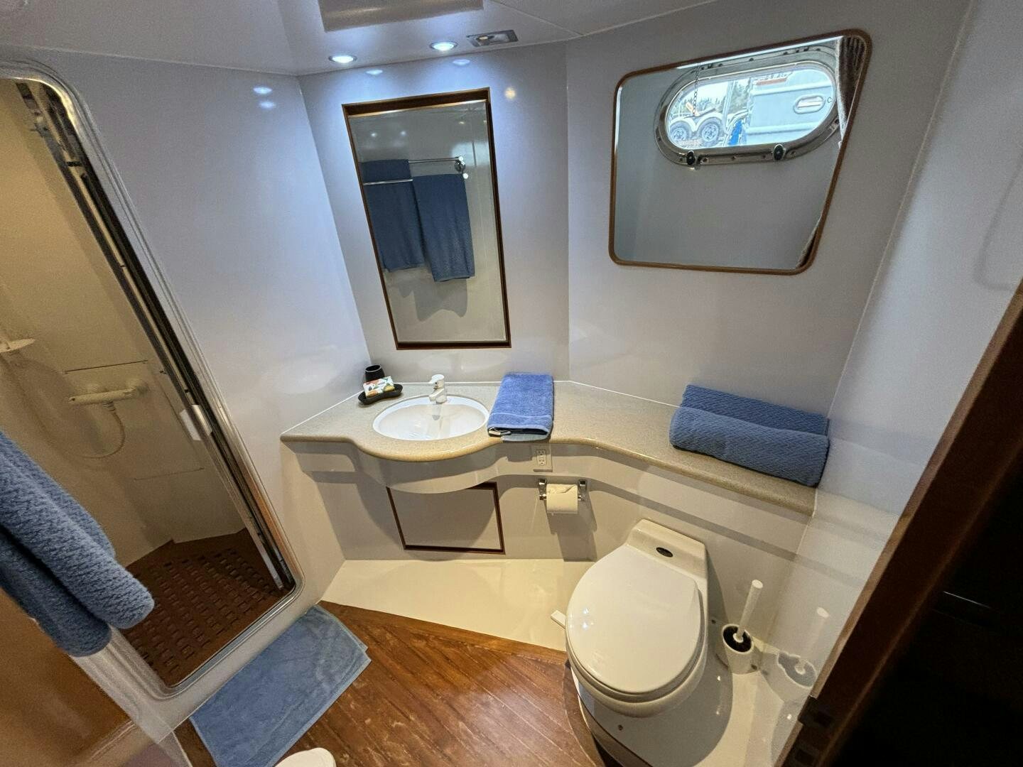 a bathroom with a tub sink and a toilet aboard ROYAL VIKING Yacht for Sale