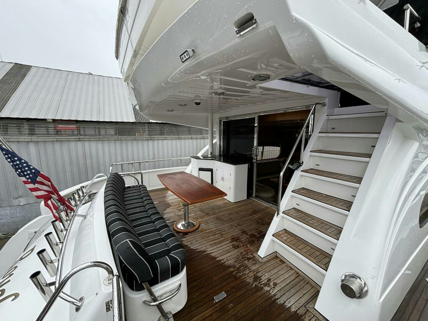 a room with a bed and a chair aboard ROYAL VIKING Yacht for Sale