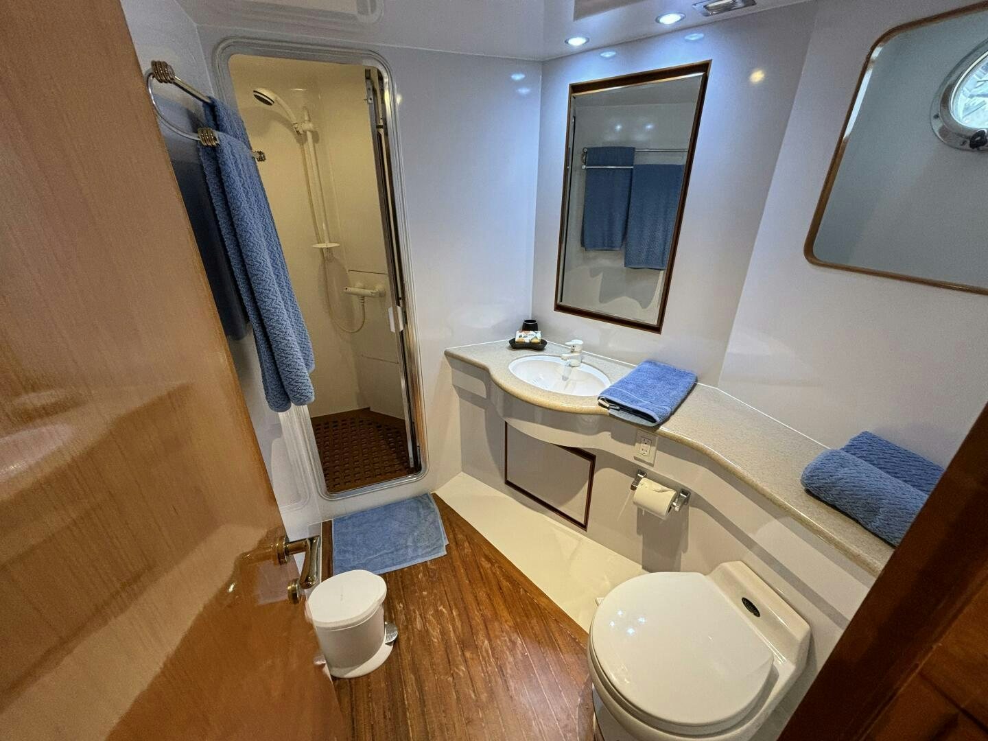 a bathroom with a shower and toilet aboard ROYAL VIKING Yacht for Sale