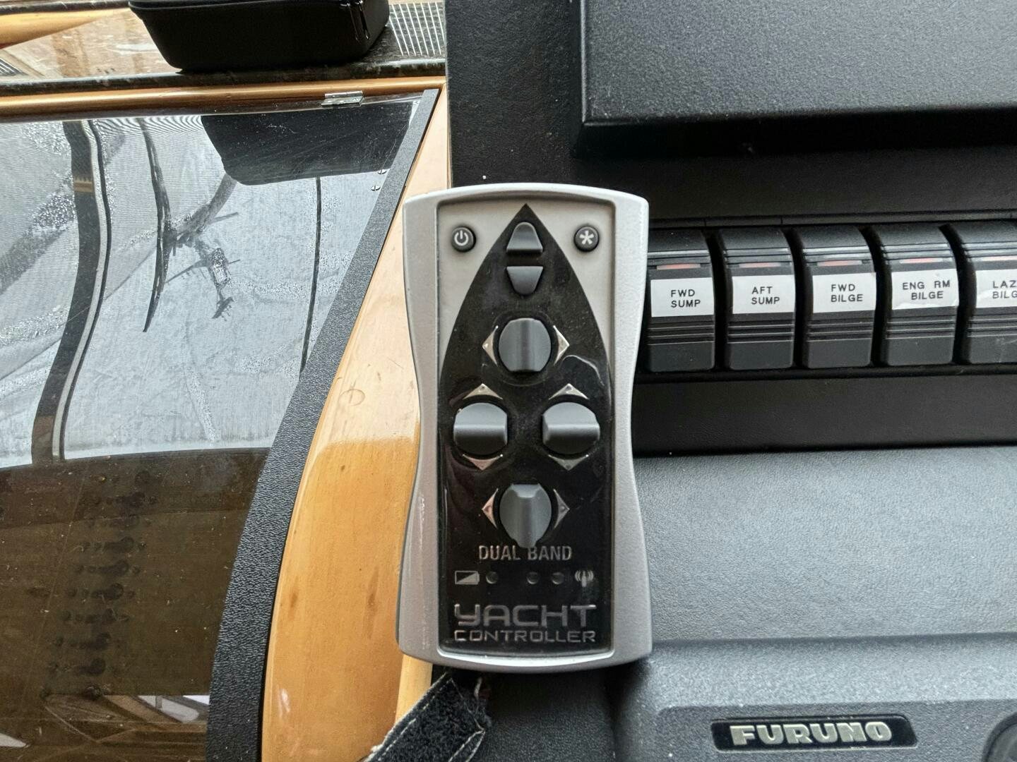 a black rectangular object with a silver circle on it aboard ROYAL VIKING Yacht for Sale