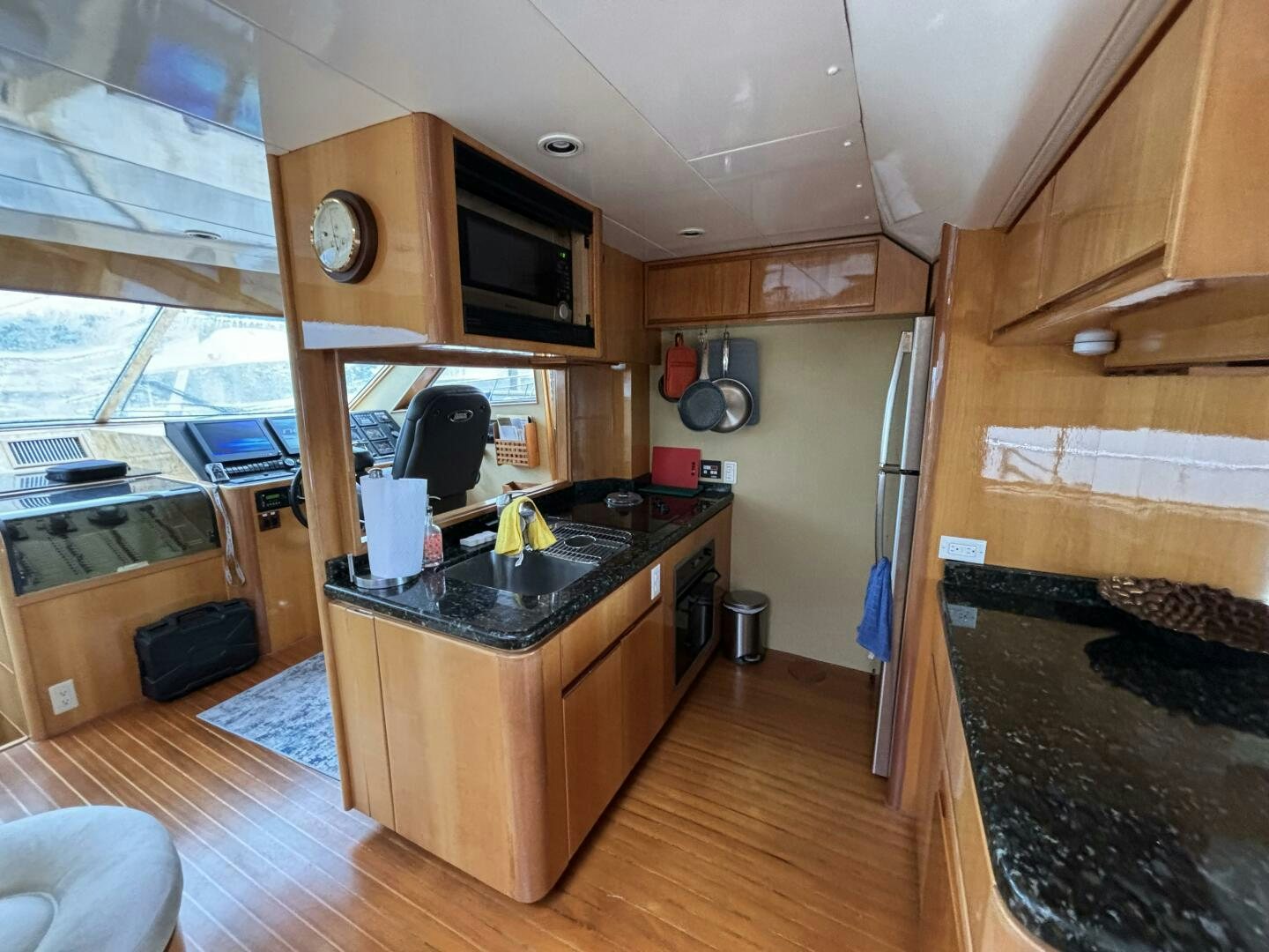 a kitchen with a wood floor aboard ROYAL VIKING Yacht for Sale