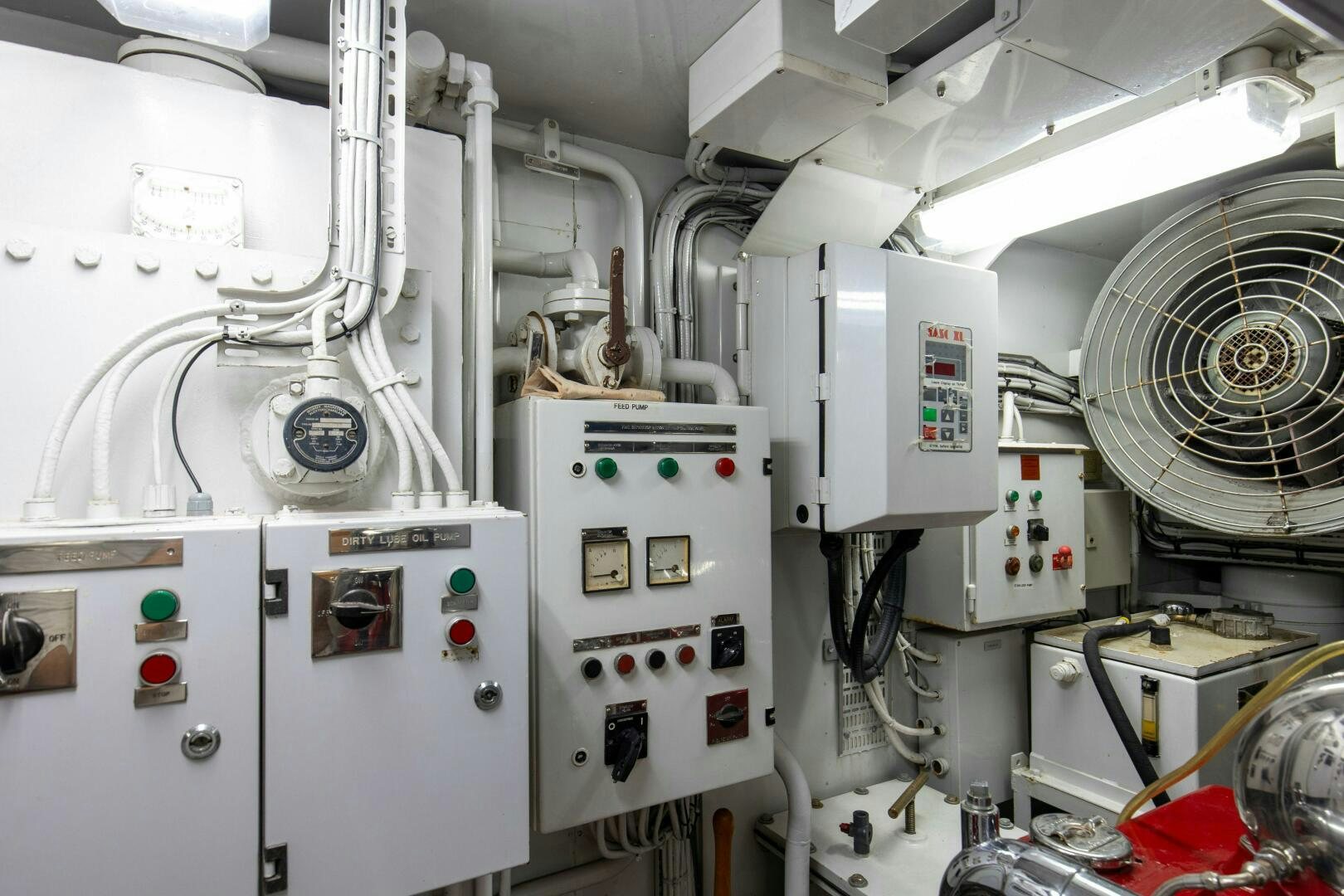 a room with several machines aboard BOSS Yacht for Sale