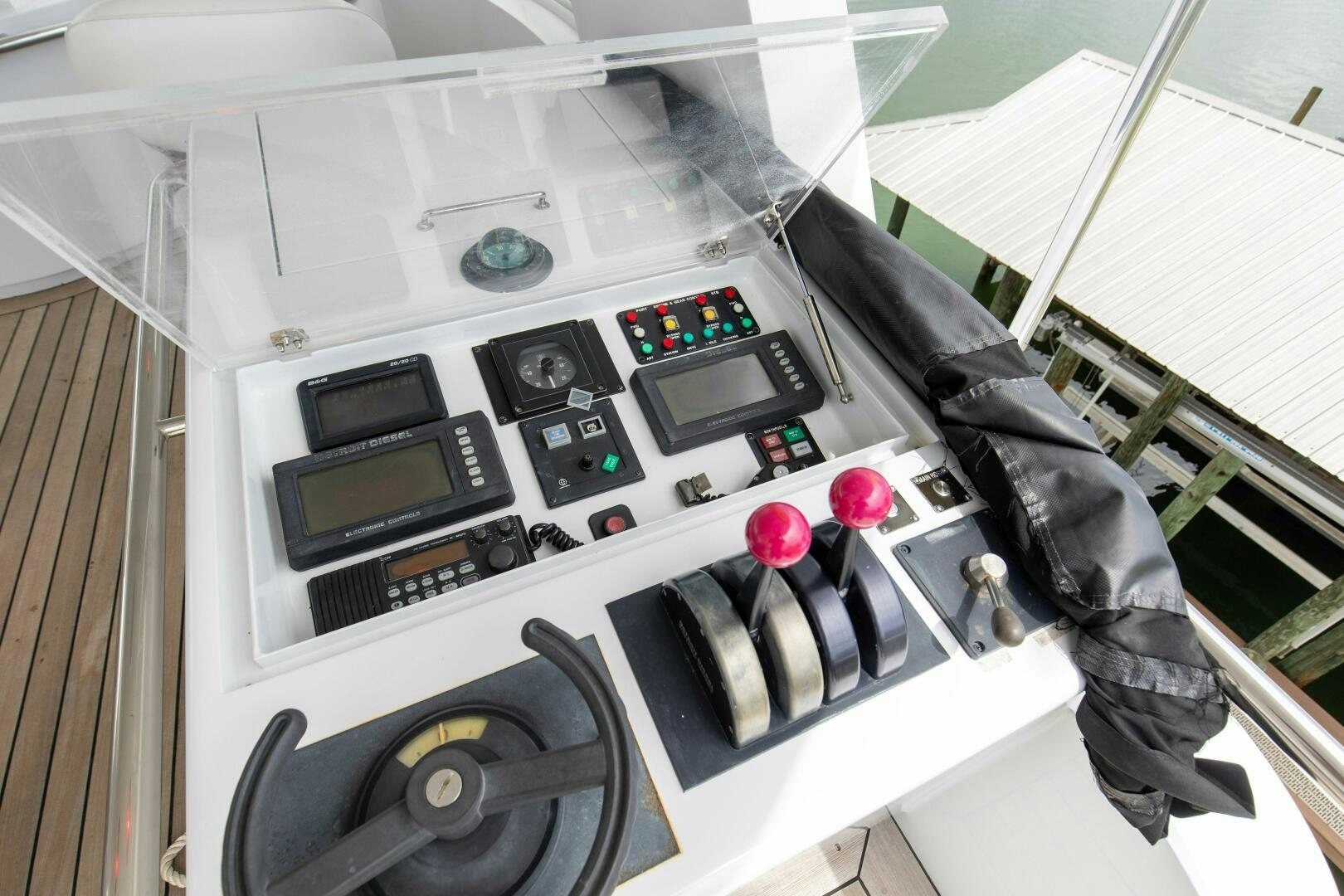 a person standing next to a white machine aboard BOSS Yacht for Sale