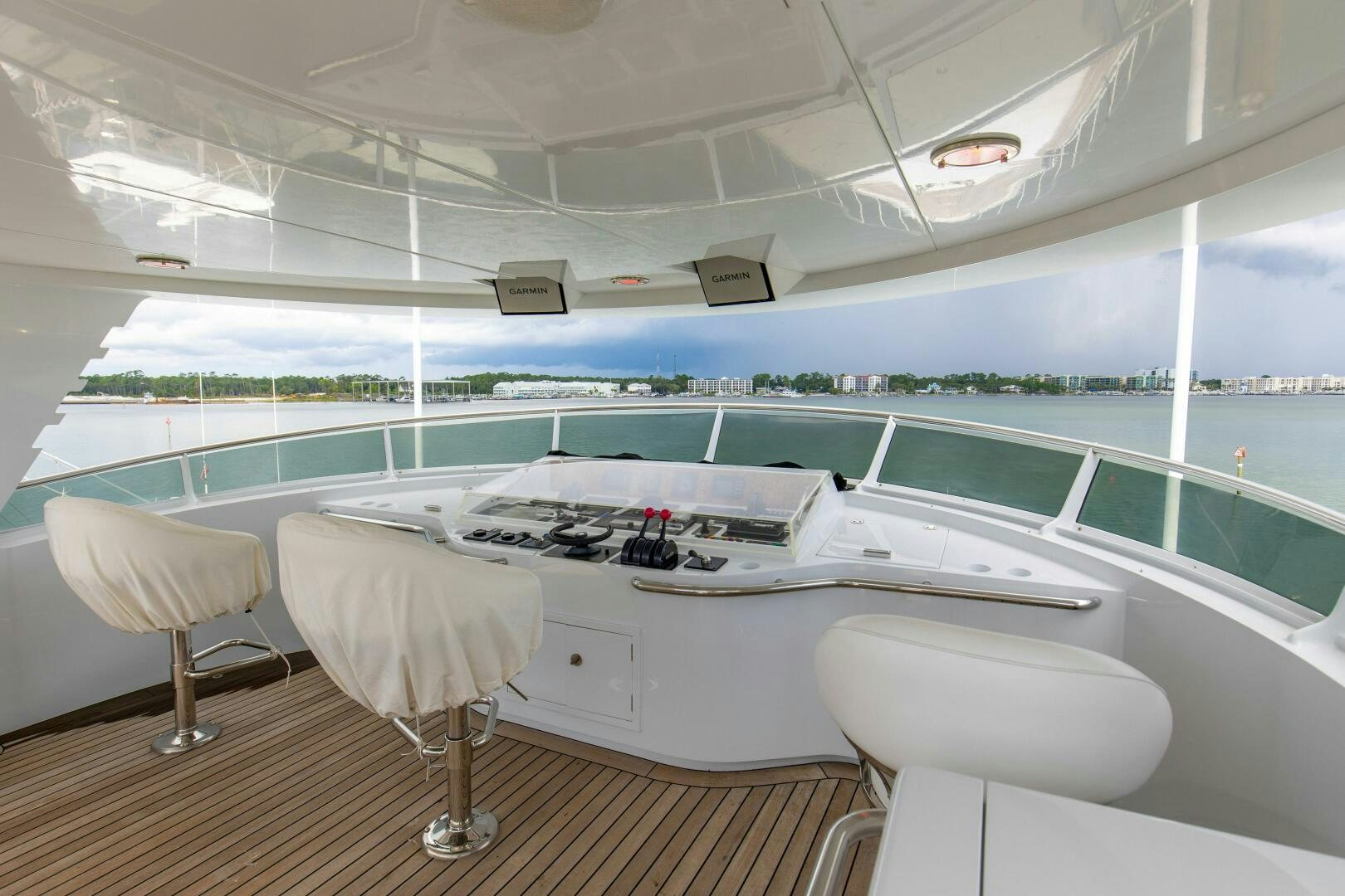 a room with a table and chairs aboard BOSS Yacht for Sale