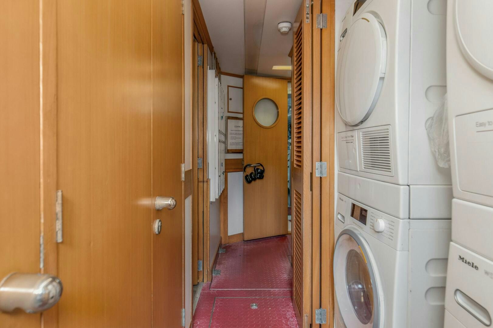 a room with washing machines aboard BOSS Yacht for Sale