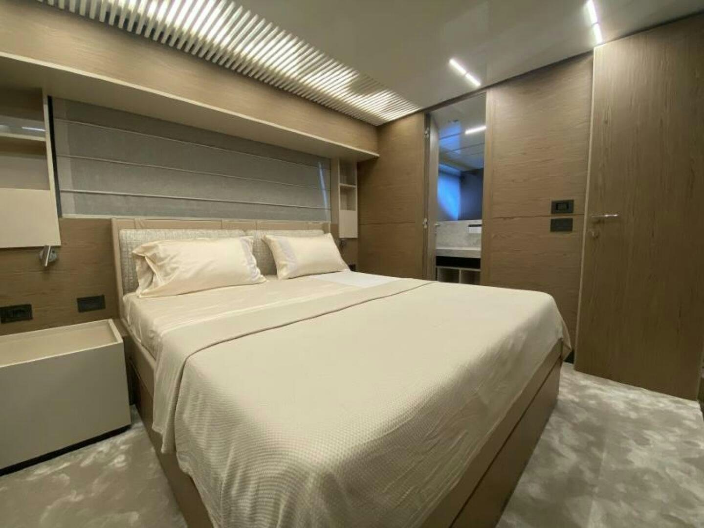 a bed in a room aboard SUNRISE - DELETE Yacht for Sale