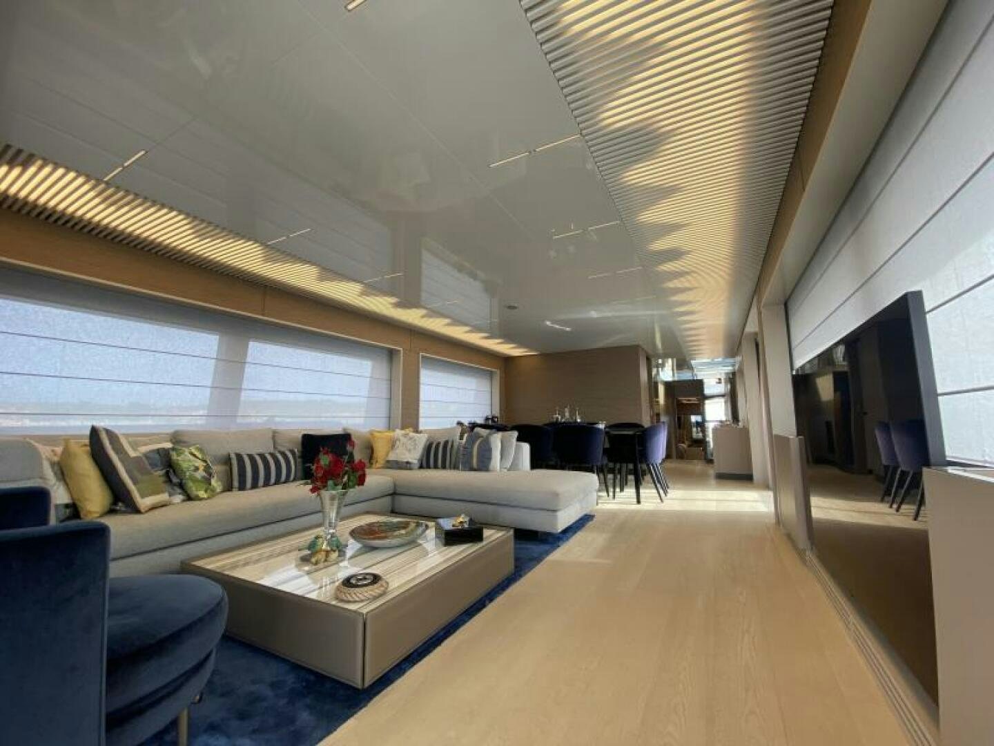 a living room with a large window aboard SUNRISE - DELETE Yacht for Sale