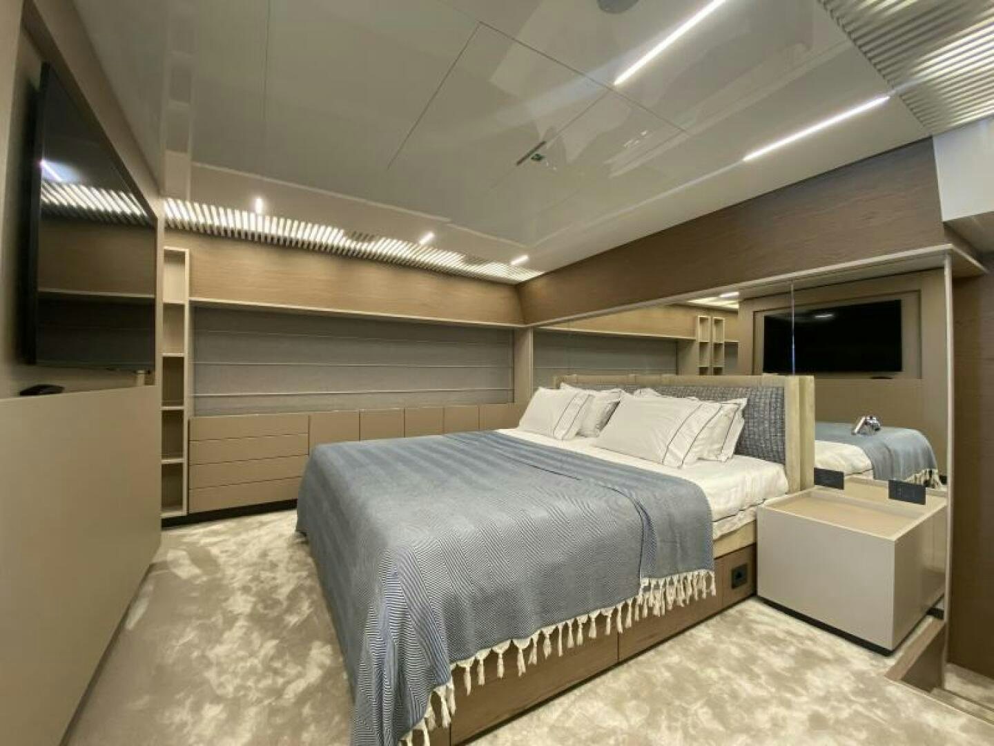 a room with a bed and a window aboard SUNRISE - DELETE Yacht for Sale