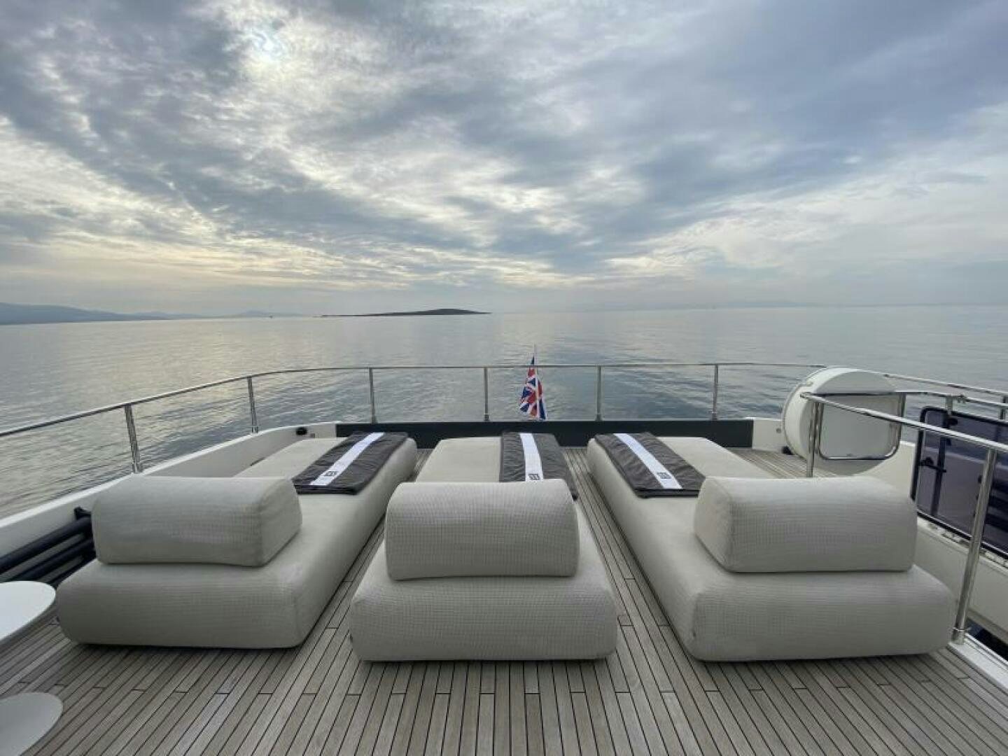 a large balcony overlooking a body of water aboard SUNRISE - DELETE Yacht for Sale