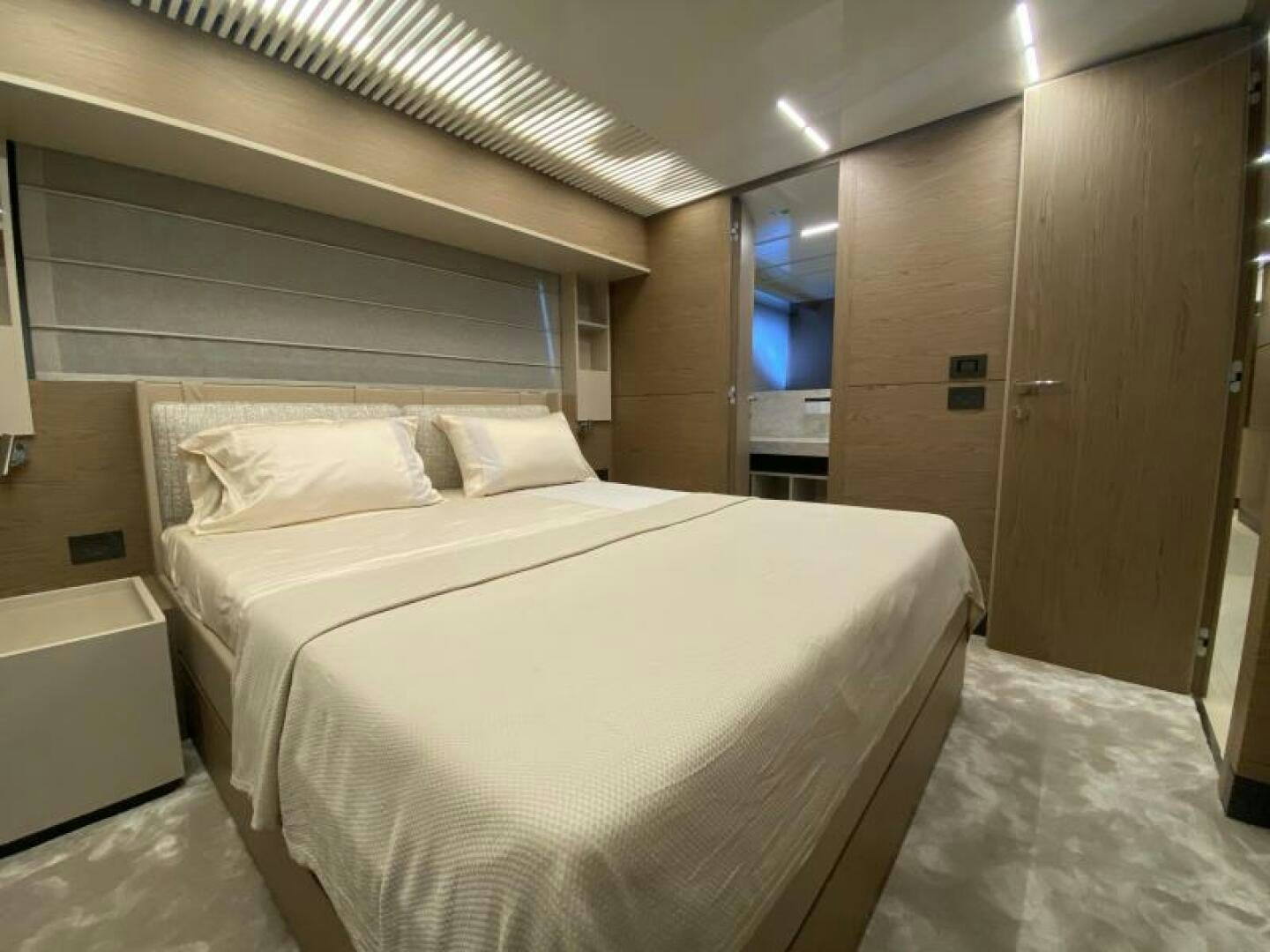 a bed in a room aboard SUNRISE - DELETE Yacht for Sale