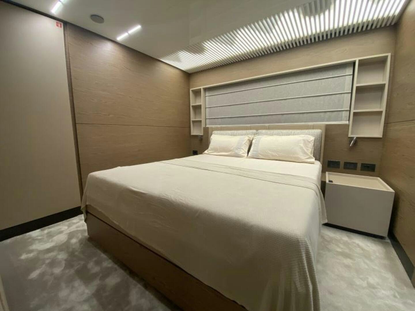 a bed in a room aboard SUNRISE - DELETE Yacht for Sale