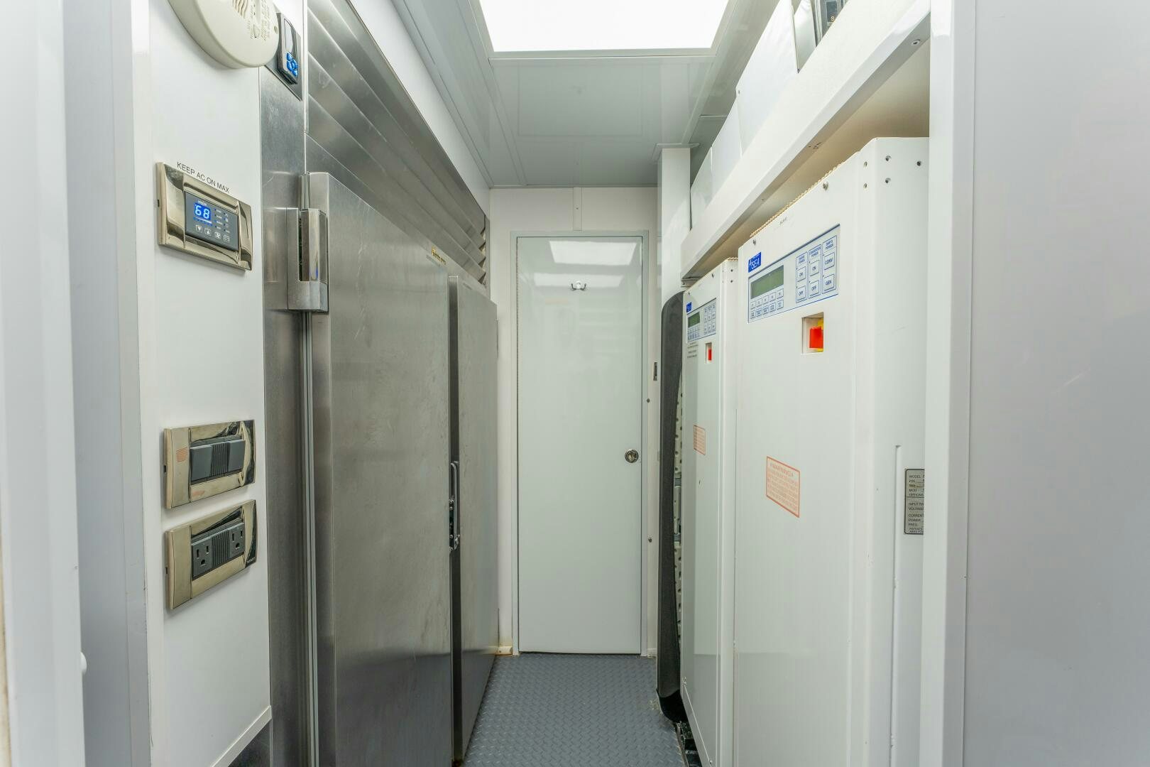 a hallway with doors aboard RELENTLESS Yacht for Sale