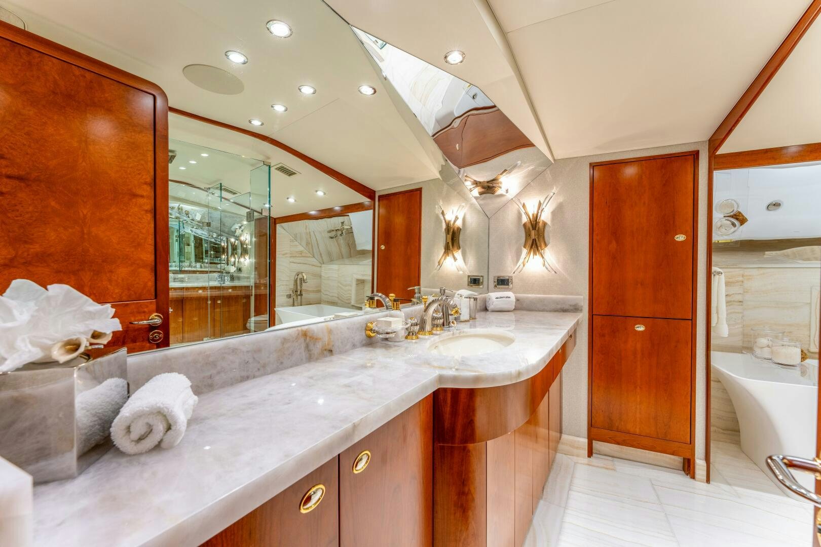 a bathroom with a large mirror aboard RELENTLESS Yacht for Sale