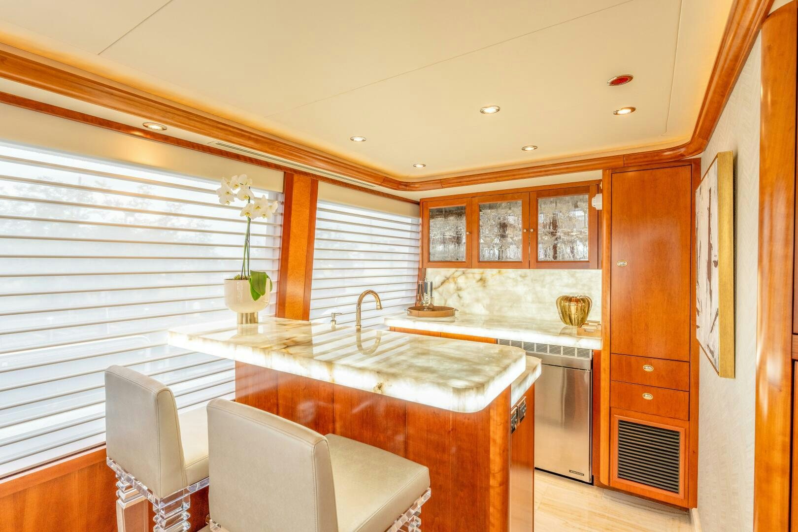 a kitchen with a large island aboard RELENTLESS Yacht for Sale