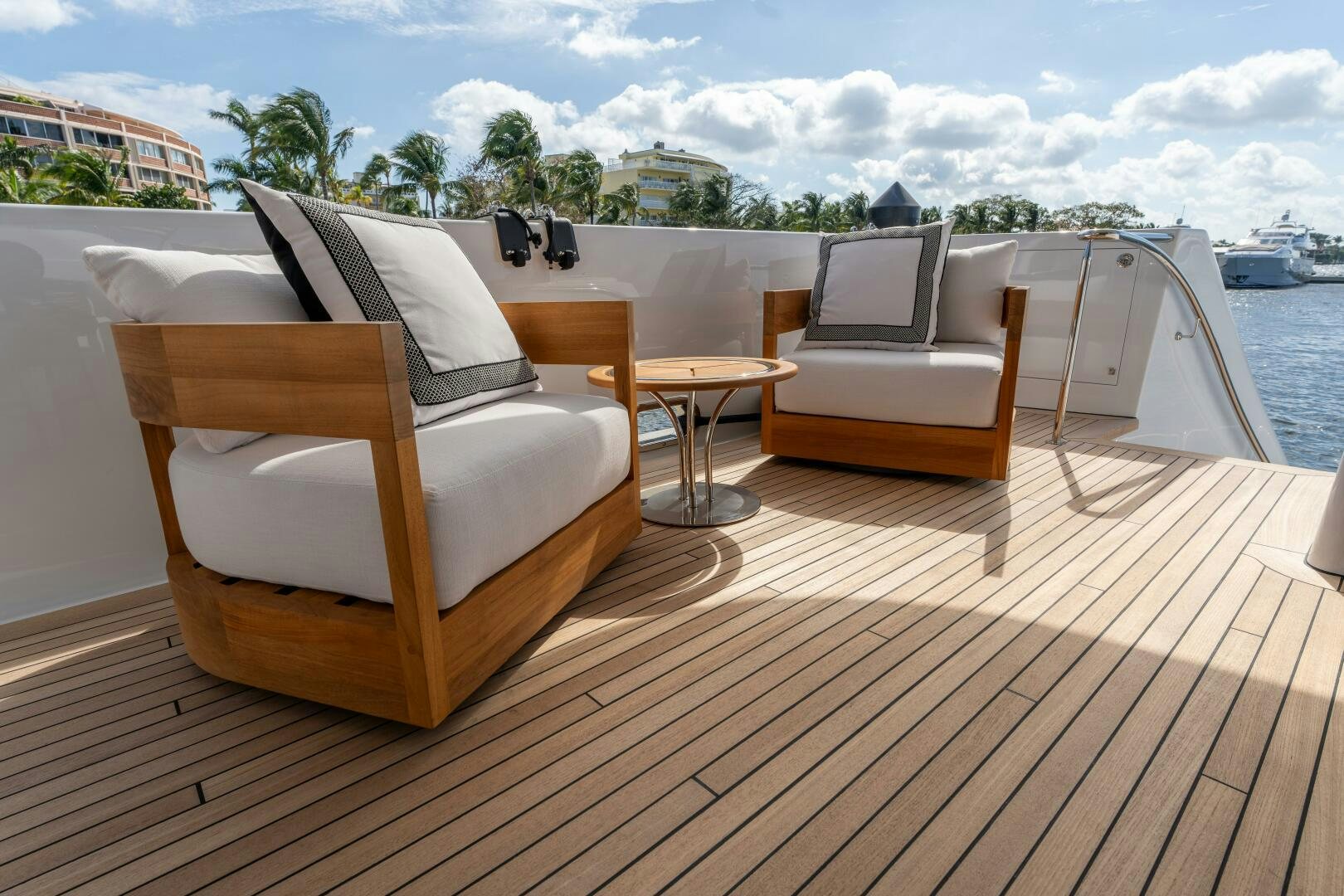 a room with a table and chairs on it aboard RELENTLESS Yacht for Sale