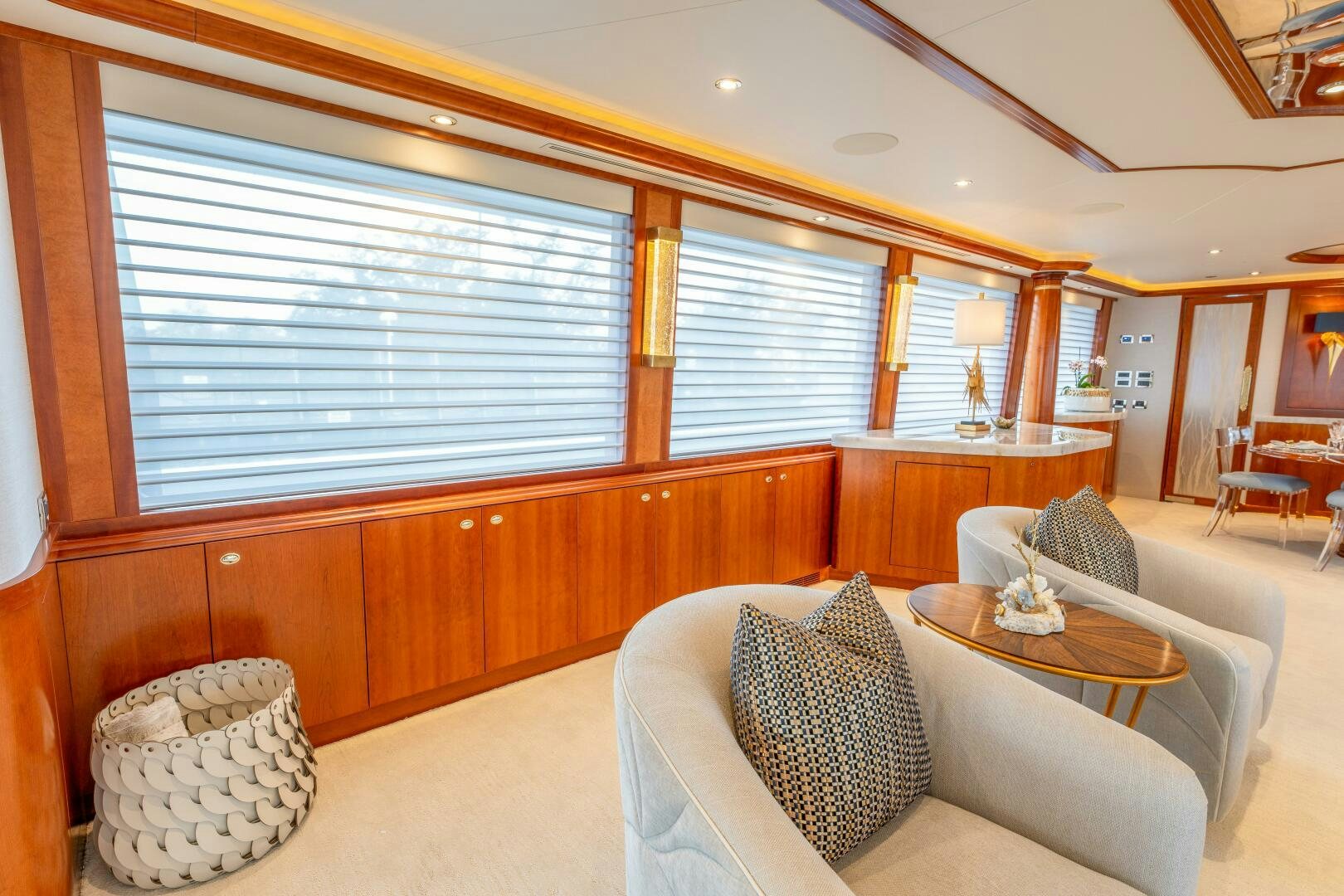 a living room with a couch and a table aboard RELENTLESS Yacht for Sale