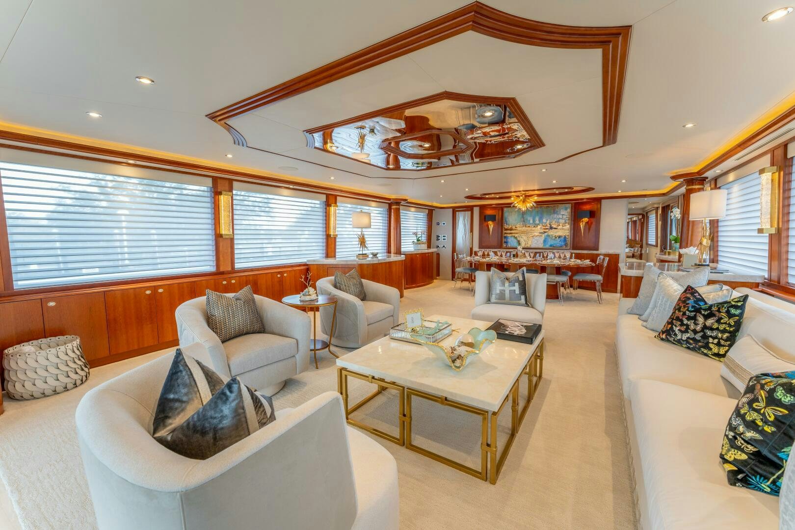 a living room with a large mirror aboard RELENTLESS Yacht for Sale