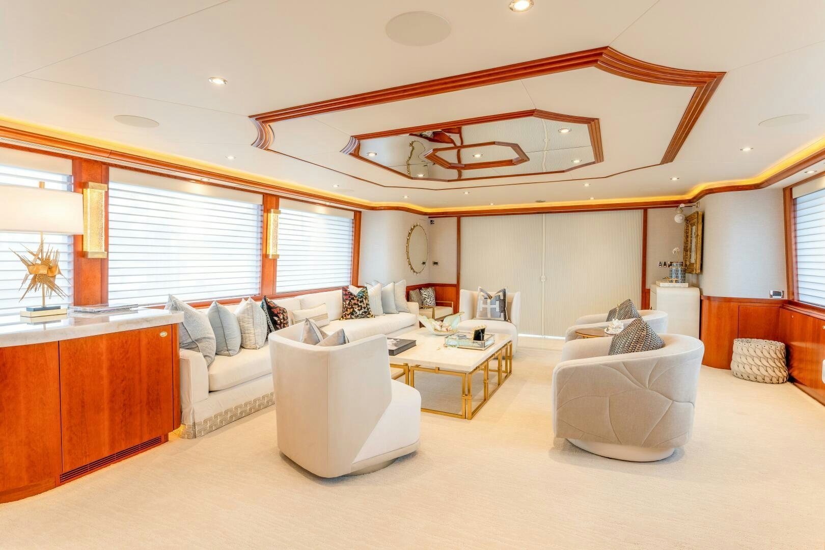 a large living room with a large ceiling fan aboard RELENTLESS Yacht for Sale