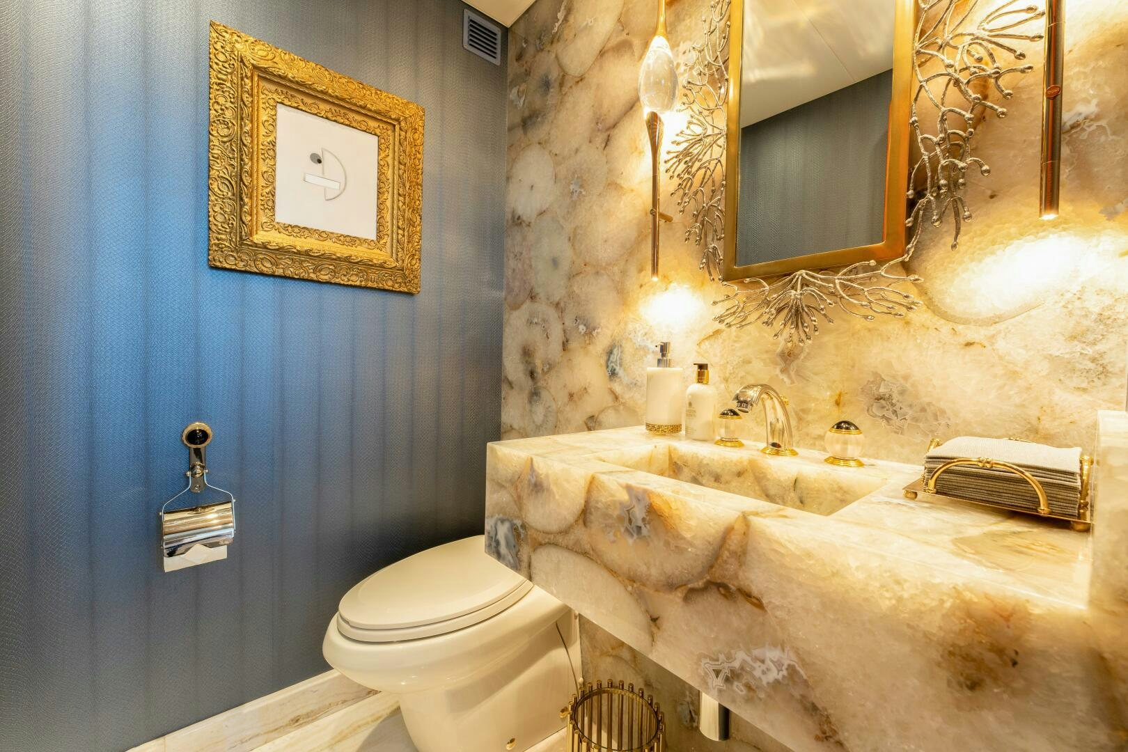 a bathroom with a bathtub sink and toilet aboard RELENTLESS Yacht for Sale