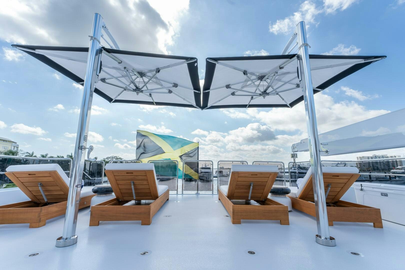 a group of chairs on a beach aboard RELENTLESS Yacht for Sale