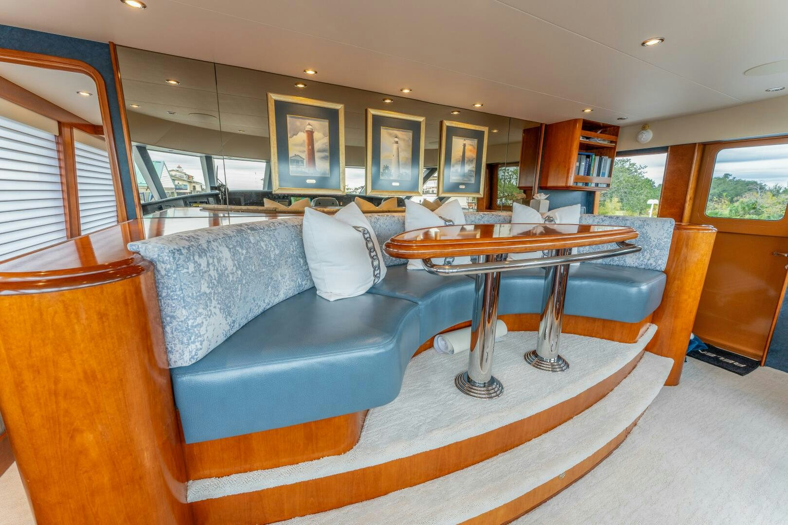 a living room with a couch and a table aboard RELENTLESS Yacht for Sale