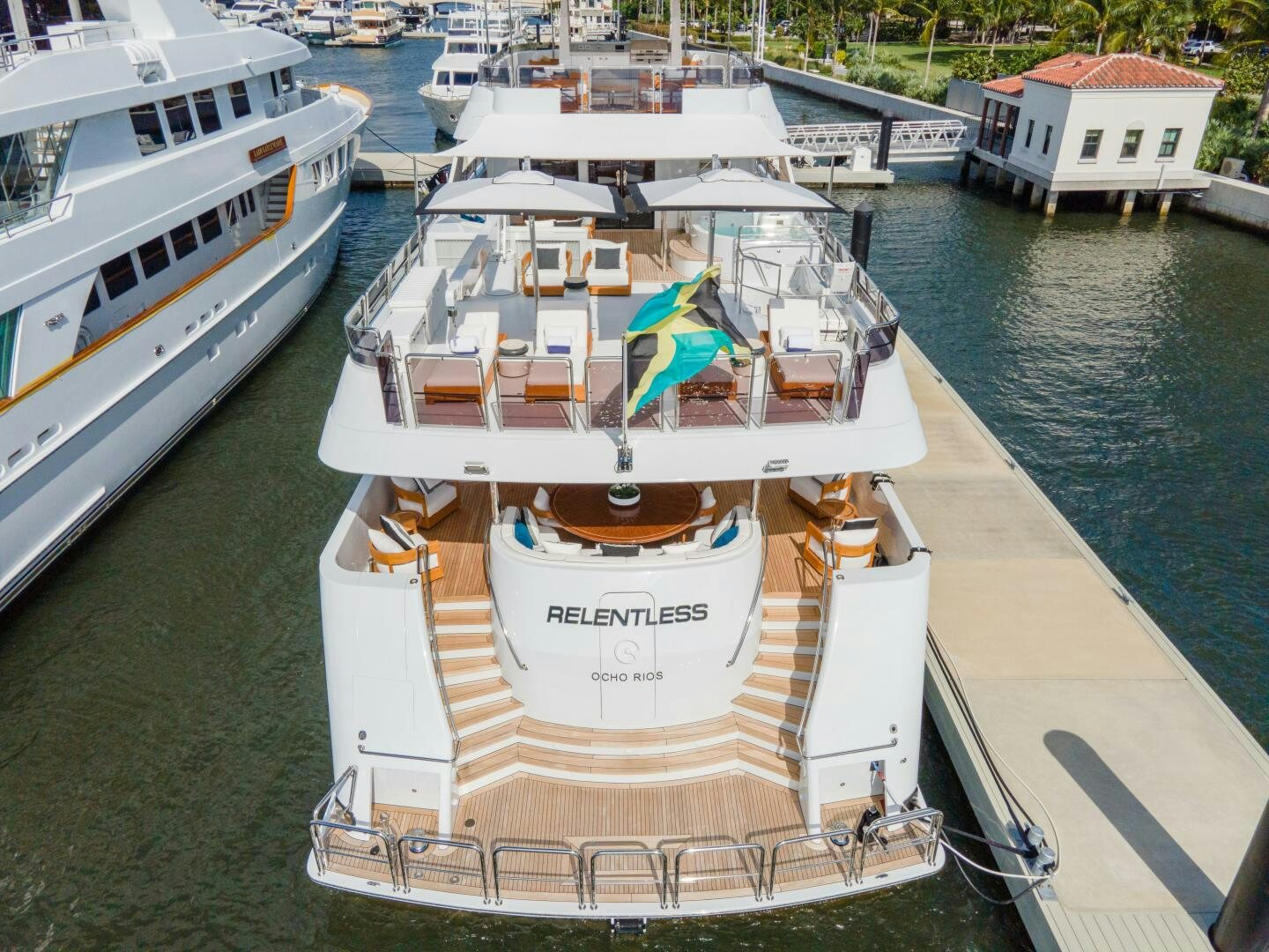 a boat docked at a pier aboard RELENTLESS Yacht for Sale
