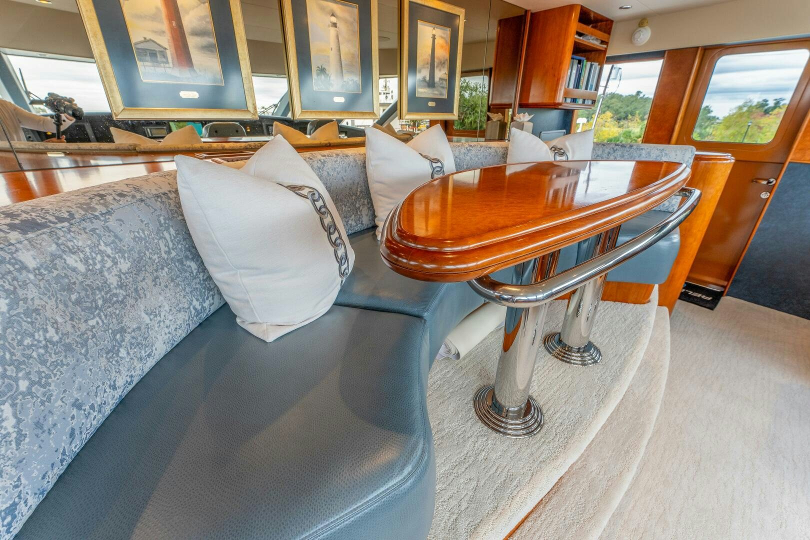 a room with a table and chairs aboard RELENTLESS Yacht for Sale