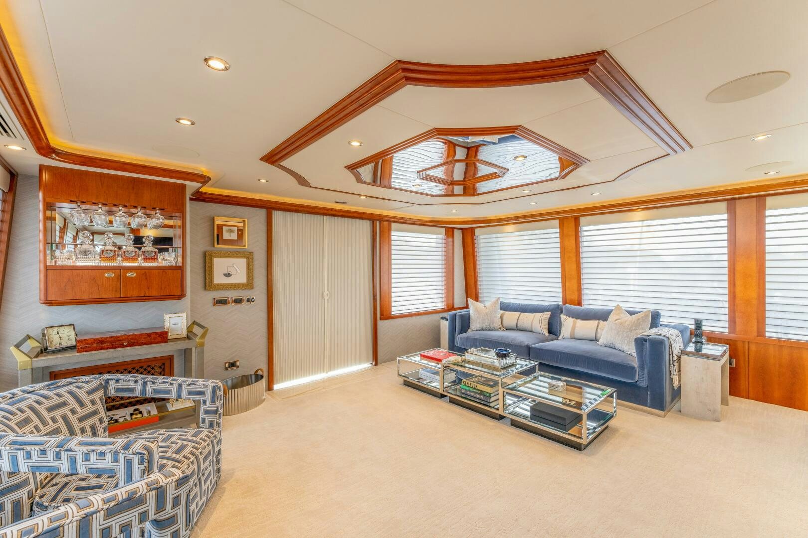 a living room with a large open ceiling aboard RELENTLESS Yacht for Sale