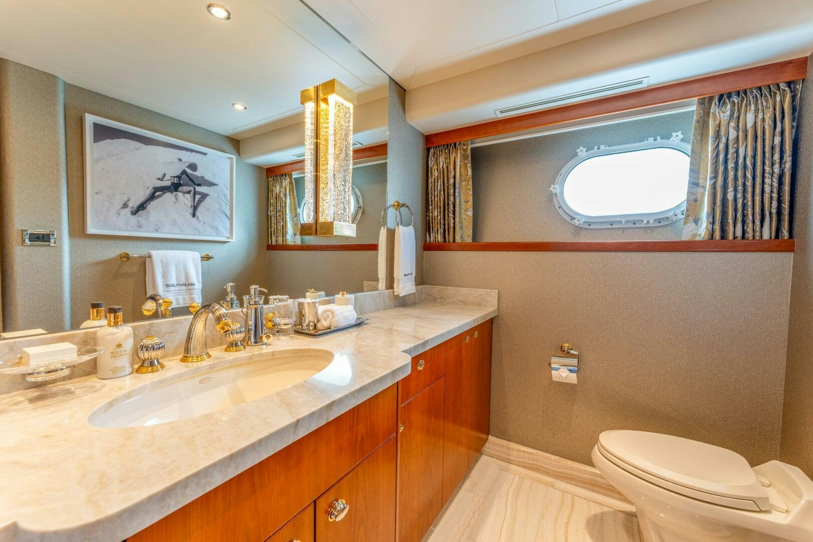 a bathroom with a large mirror aboard RELENTLESS Yacht for Sale
