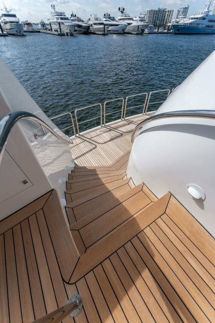 a deck with boats in the water aboard RELENTLESS Yacht for Sale