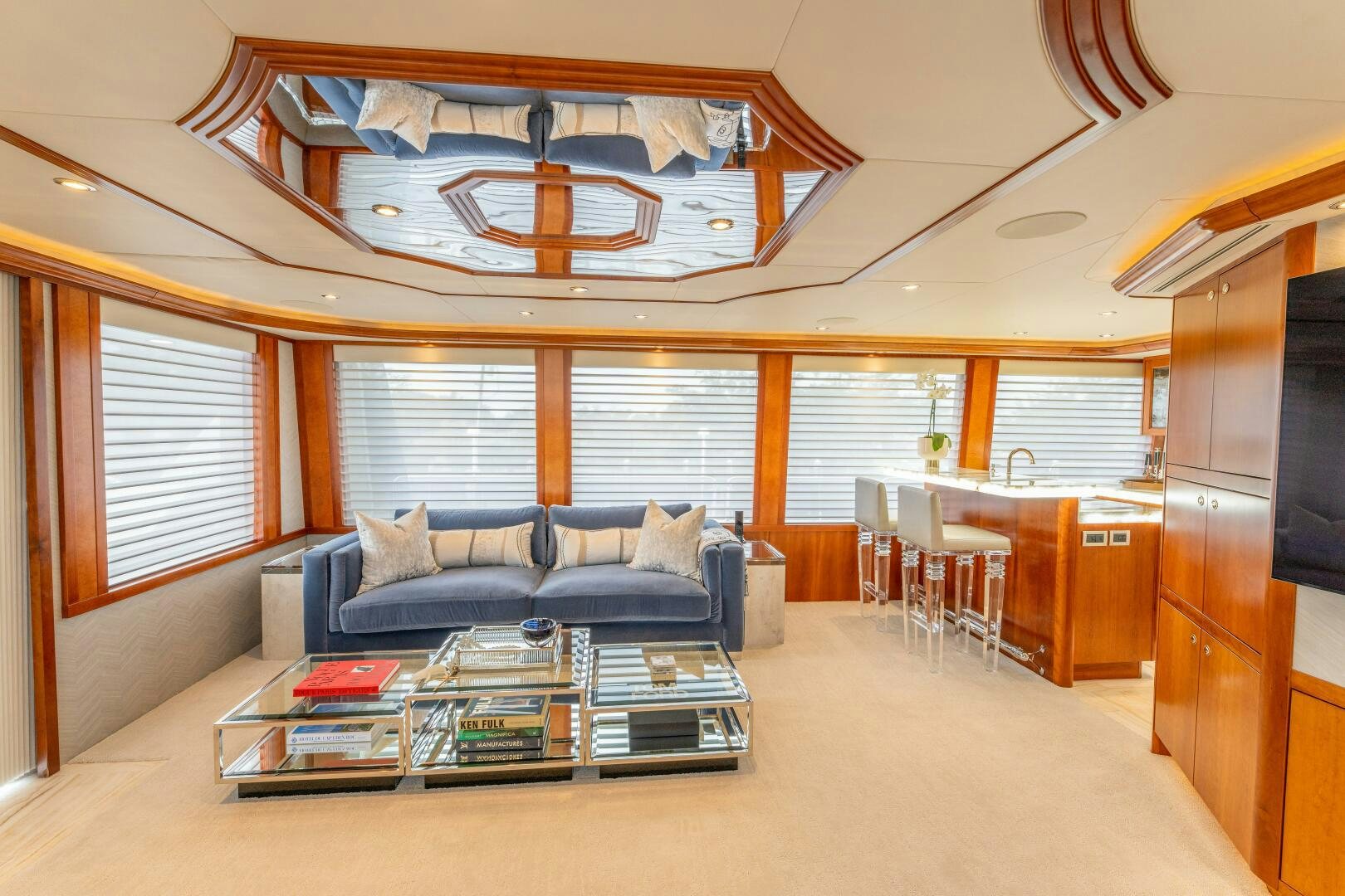a living room with a large open ceiling aboard RELENTLESS Yacht for Sale