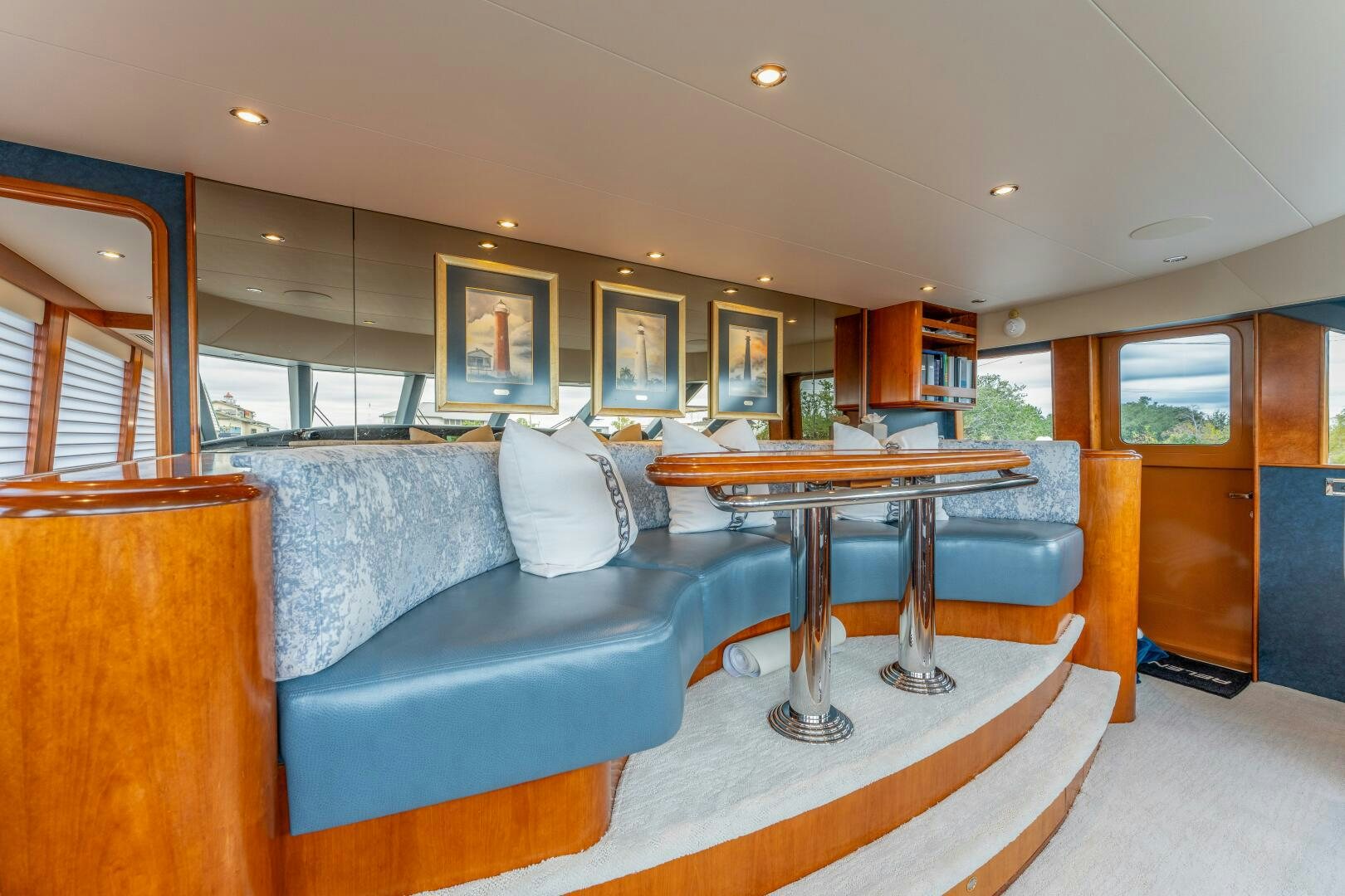 a living room with a couch and a table aboard RELENTLESS Yacht for Sale